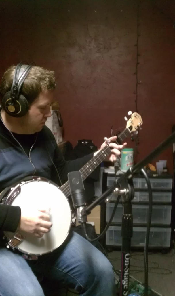 Brandon tunes up the banjo for "woods pretty"